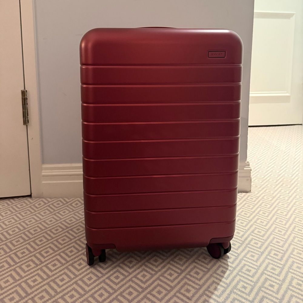 Away The Bigger Carry On in Ruby Haze Hardshell Suitcase